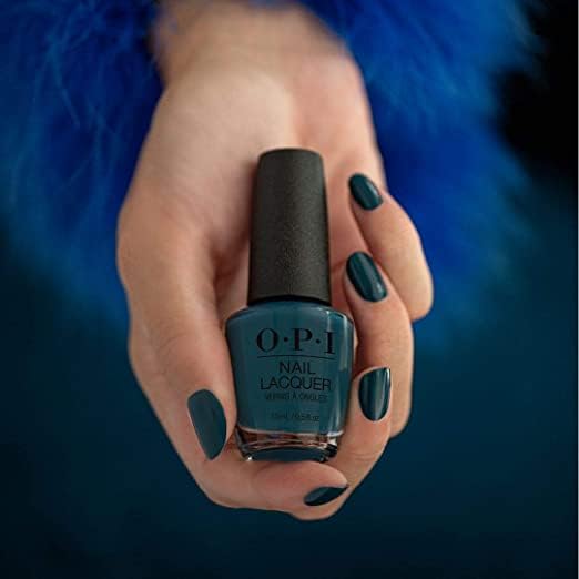 Hand model wearing Drama at La Scala manicure in lifestyle setting for polished look benefit