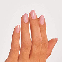 Manicurist applying OPI to nails exhibiting salon-quality glossy finish