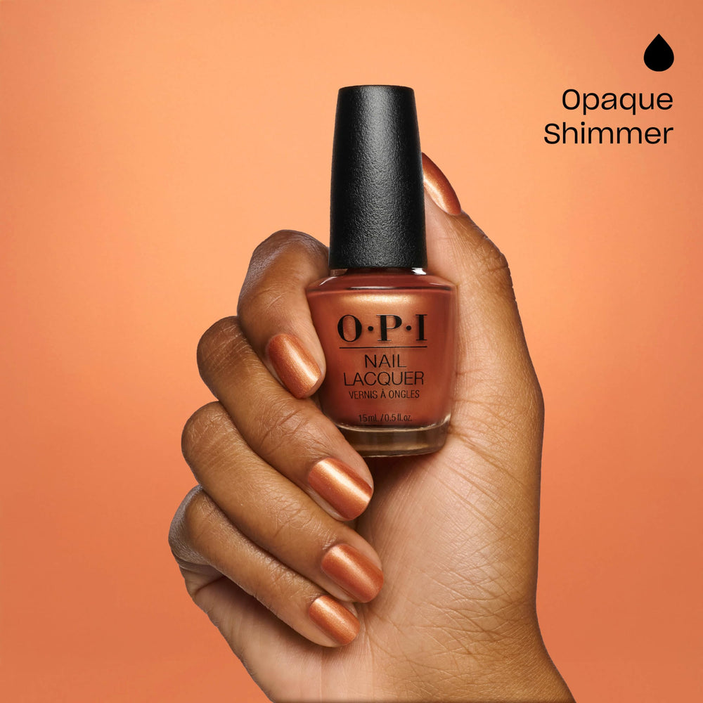 OPI swatch on nail wheel displaying true Goodie as Gold color for shade reference