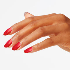 OPI polish being applied on a nail for streak-free, salon results