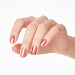Close-up of OPI shimmer particles in lacquer showing luminous texture and refined sparkle