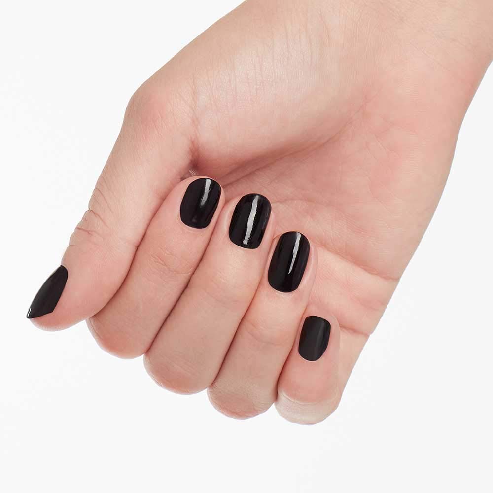 OPI manicure in evening outfit highlighting sophisticated finish