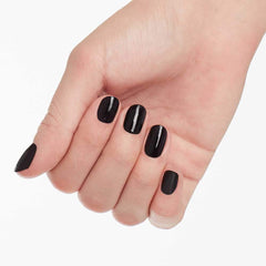OPI manicure in evening outfit highlighting sophisticated finish