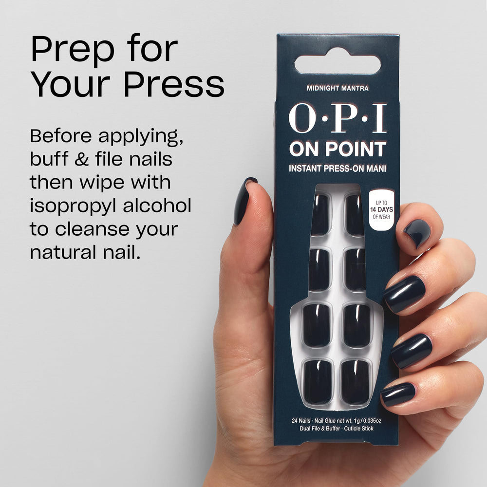OPI Midnight Mantra hand holding tips to show scale and natural short-round look
