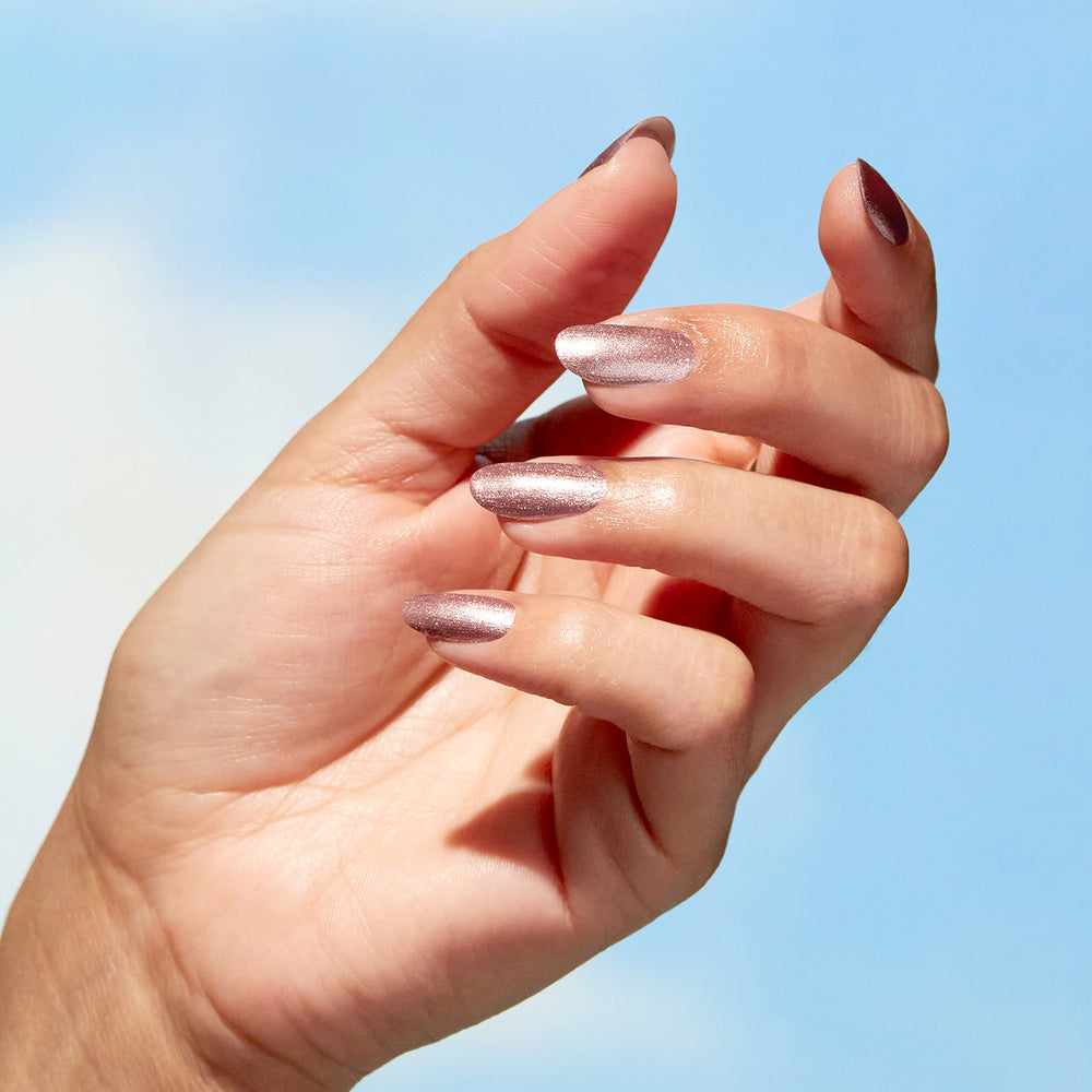 OPI nail swatch on hand illustrating natural neutral look and polish durability benefit