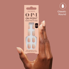 OPI Peach Smoochie stacked tips stored flat after wear, indicating easy reuse