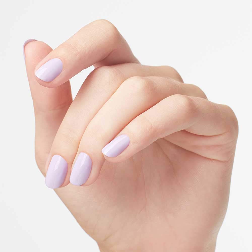 OPI bottle on a tropical surface representing Fiji Collection and resort-ready polish benefit