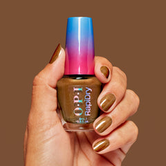 OPI Fast Foodie on hand in lifestyle setting demonstrating quick-dry convenience