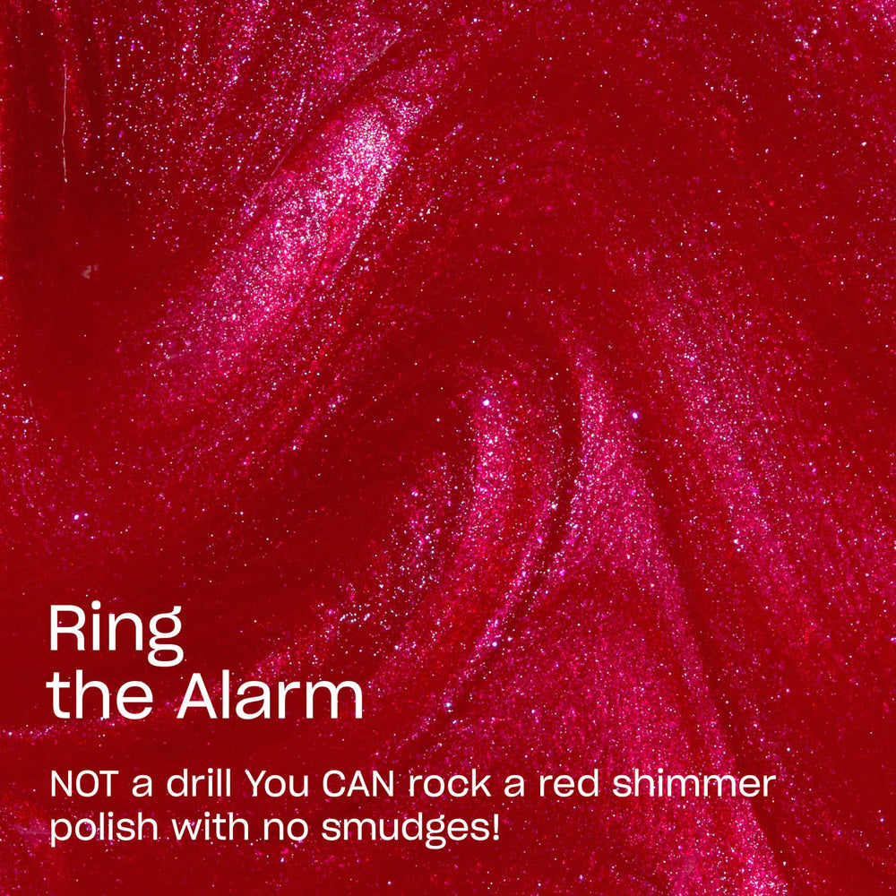 OPI RapiDry ring the alarm swatch on nail wheel showing opaque coverage