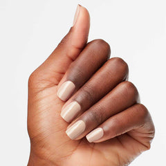 OPI painted nails in lifestyle setting showing chip-resistant, polished look benefit