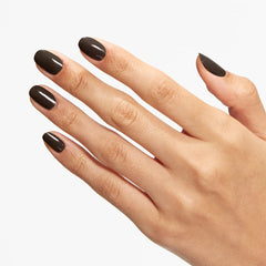 OPI swatch on natural nail hand showing even coverage and rich color