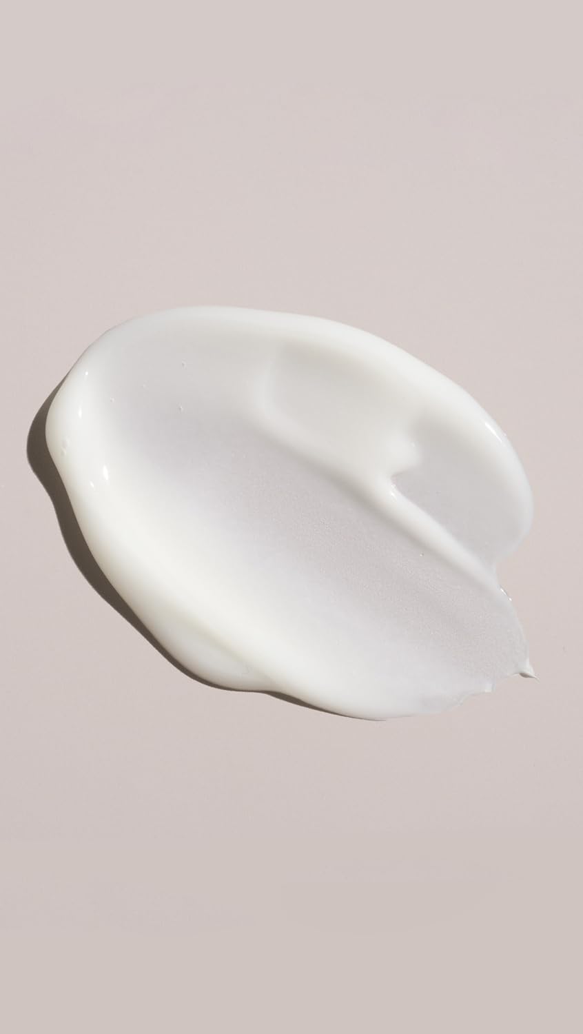 Oribe gel‑cream texture closeup illustrating lightweight conditioning benefit