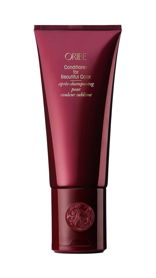 Oribe conditioner front bottle showing elegant label and size benefit
