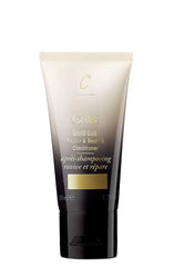ORIBE Dry Texturizing Spray aerosol top illustrating precision spray and instant lift benefit