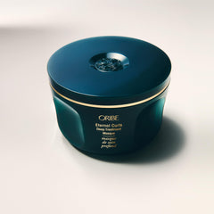 Oribe Eternal Curls open jar revealing rich masque for detangling