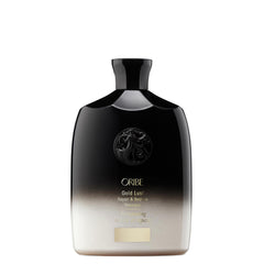Oribe Gold Lust front packaging showing elegant bottle and benefit