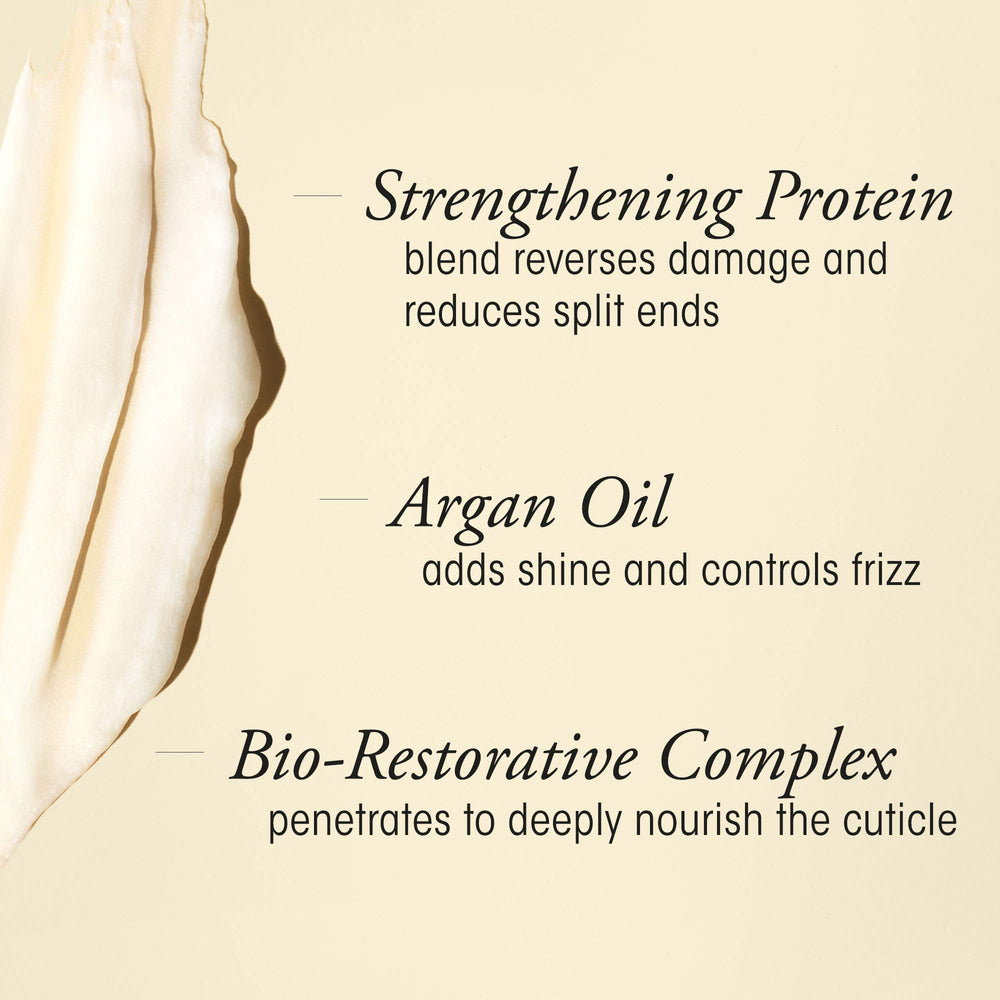 Hand pouring Oribe pouch into pump bottle for convenient refill
