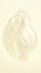 Oribe Hair Alchemy pump and cap detail illustrating easy dispensing