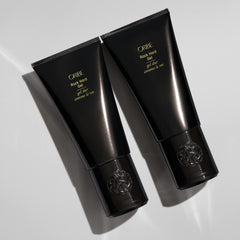 Oribe rock hard gel in use creating defined spikes with long-lasting hold