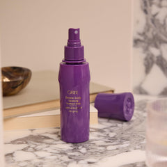 Oribe before and after styling showing fuller-looking hair benefit