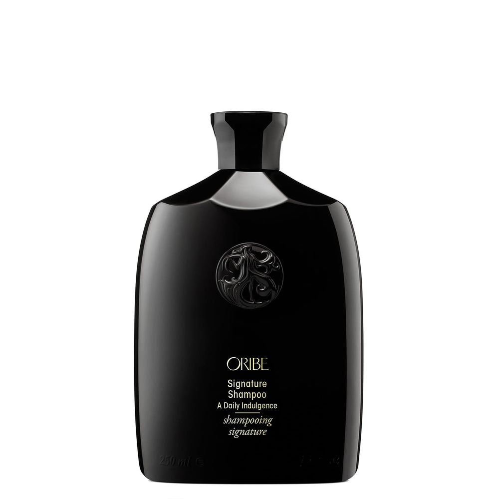 Oribe signature shampoo front bottle showing elegant packaging and luxury benefit