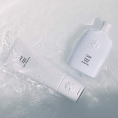 Oribe Silverati creamy texture on hand demonstrating hydration and smoothness