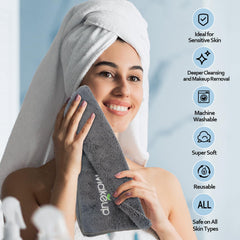 Orighty towel held in hand to show 13 by 13 inch size and portability