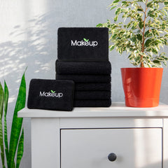 Orighty towel removing makeup from skin showing effective cleansing with water