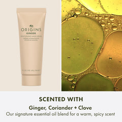 Origins Crisp Citrus tube held in hand demonstrating travel-ready size and quick absorption benefit