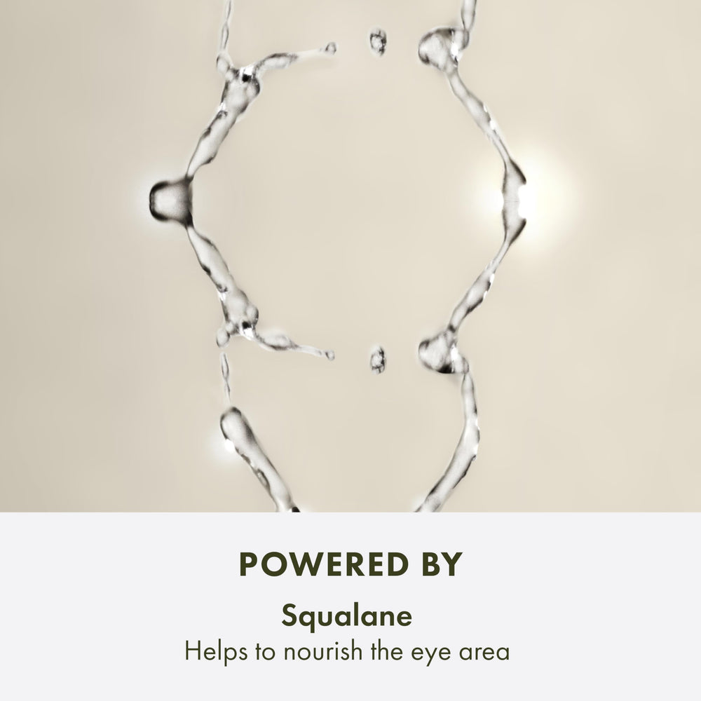 Origins Eye Doctor next to a ruler showing 0.5 fl oz size for easy scale reference