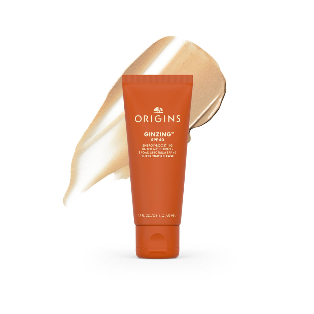 Origins GinZing front tube showing product branding and travel-friendly design benefit