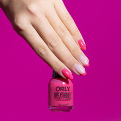 Orly The Floor Is Lava held in hand showing size and ergonomic gripper cap