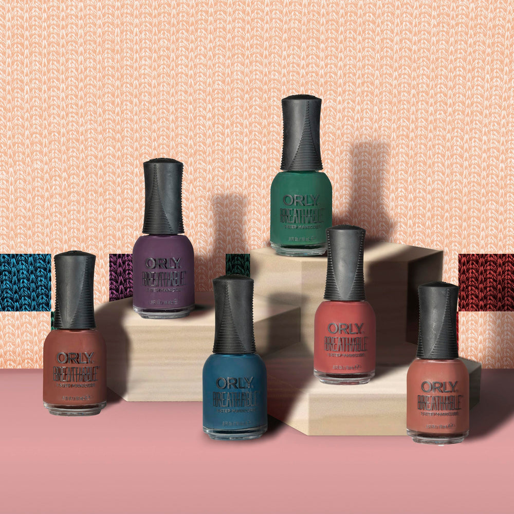 Orly polish applied on nails in cozy sweater setting showing seasonal style benefit