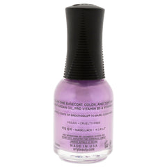 Orly brush applying Orchid You Not on nail demonstrating smooth even coverage
