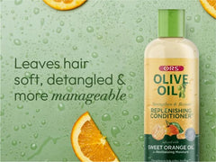 ORS being applied to hair in hands to detangle and soften strands