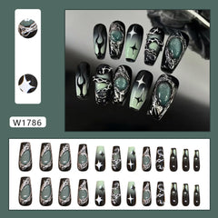 OSTTMA close-up of black to green gradient and silver accents, shows detailed finish