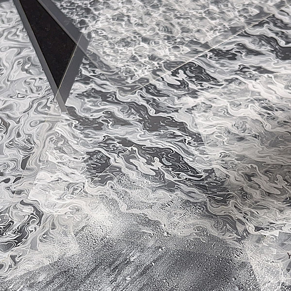 OSTTMA close-up of white sea wave detail highlighting intricate design