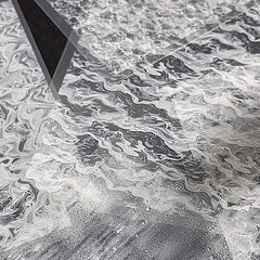 OSTTMA close-up of white sea wave detail highlighting intricate design