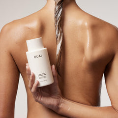 OUAI conditioner texture swirl showing creamy lightweight formula for added body