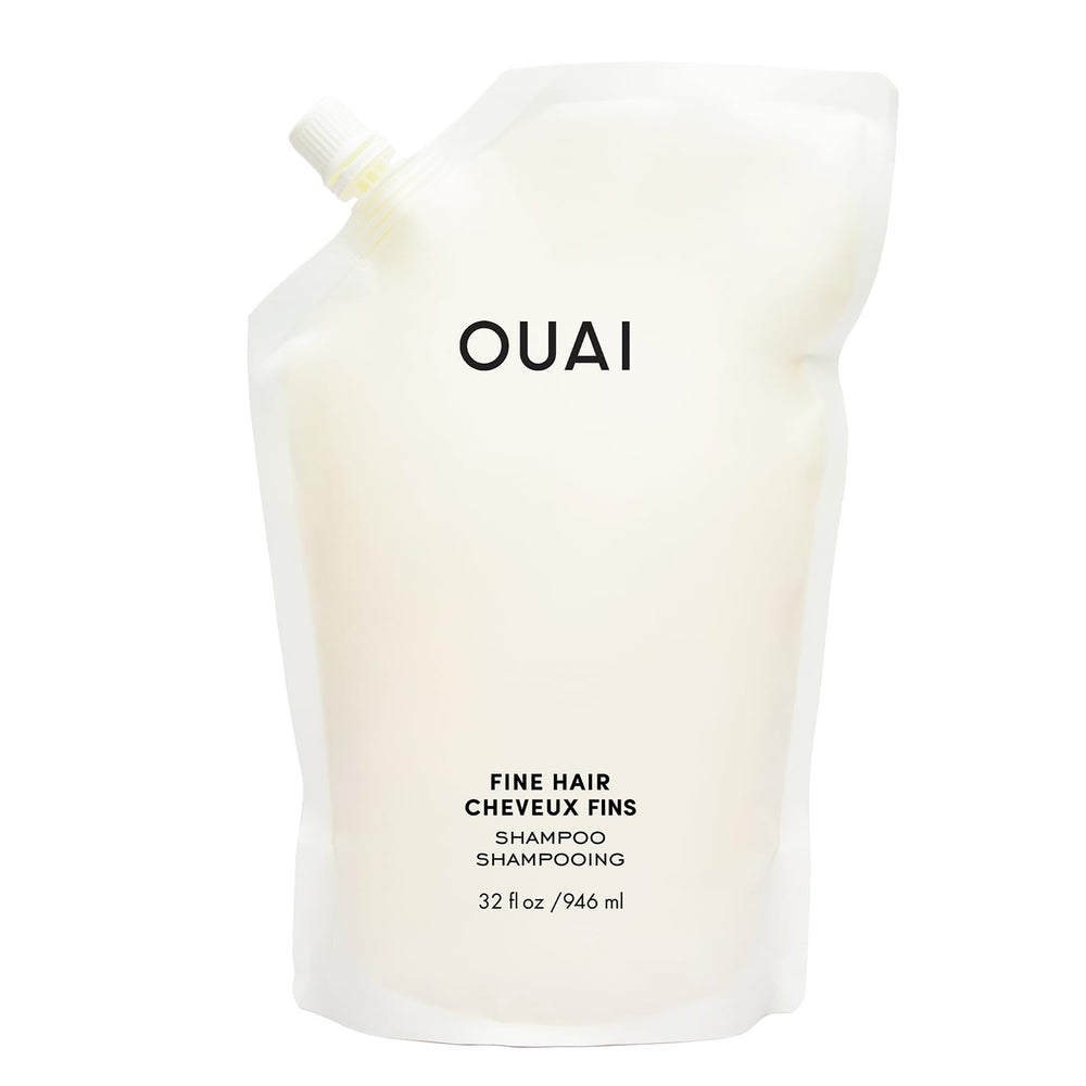 OUAI bottle front view showing 32 oz refill and clear label benefits