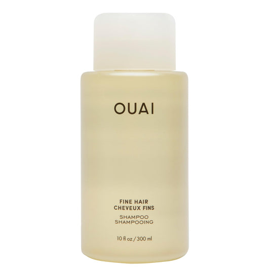 OUAI bottle front showing fine hair shampoo, clear volume benefit