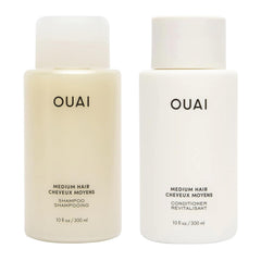 OUAI medium set front packaging showing sleek bottles and branding benefits