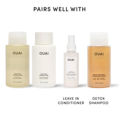 OUAI 10 fl oz bottle next to ruler showing true size