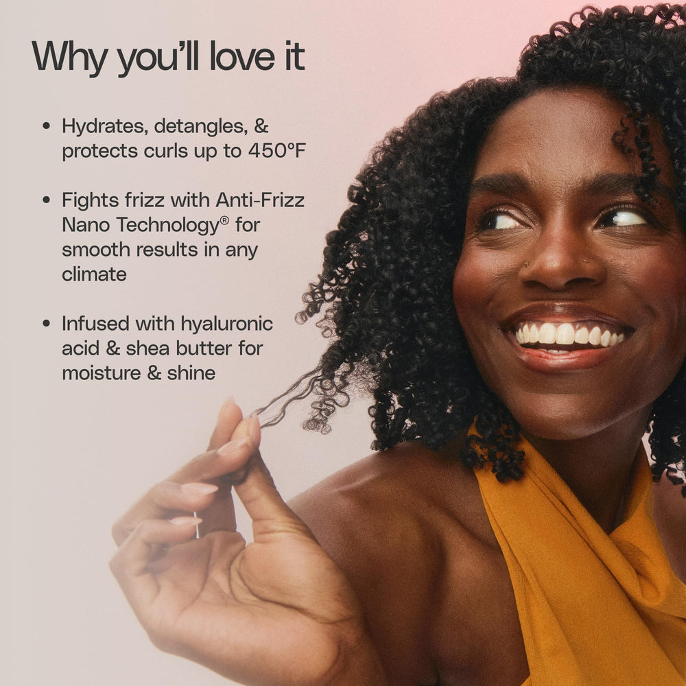Wet curly hair in shower with Ouidad shampoo showing frizz reduction benefit