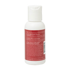 Ouidad travel gel next to hand showing 2.5 fl oz scale and travel convenience