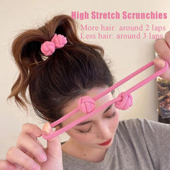 OULIGET hair tie beside a hand for scale, communicates size and stretch