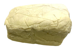 Our Earth's Secrets close-up texture of unrefined shea butter, highlights creamy purity