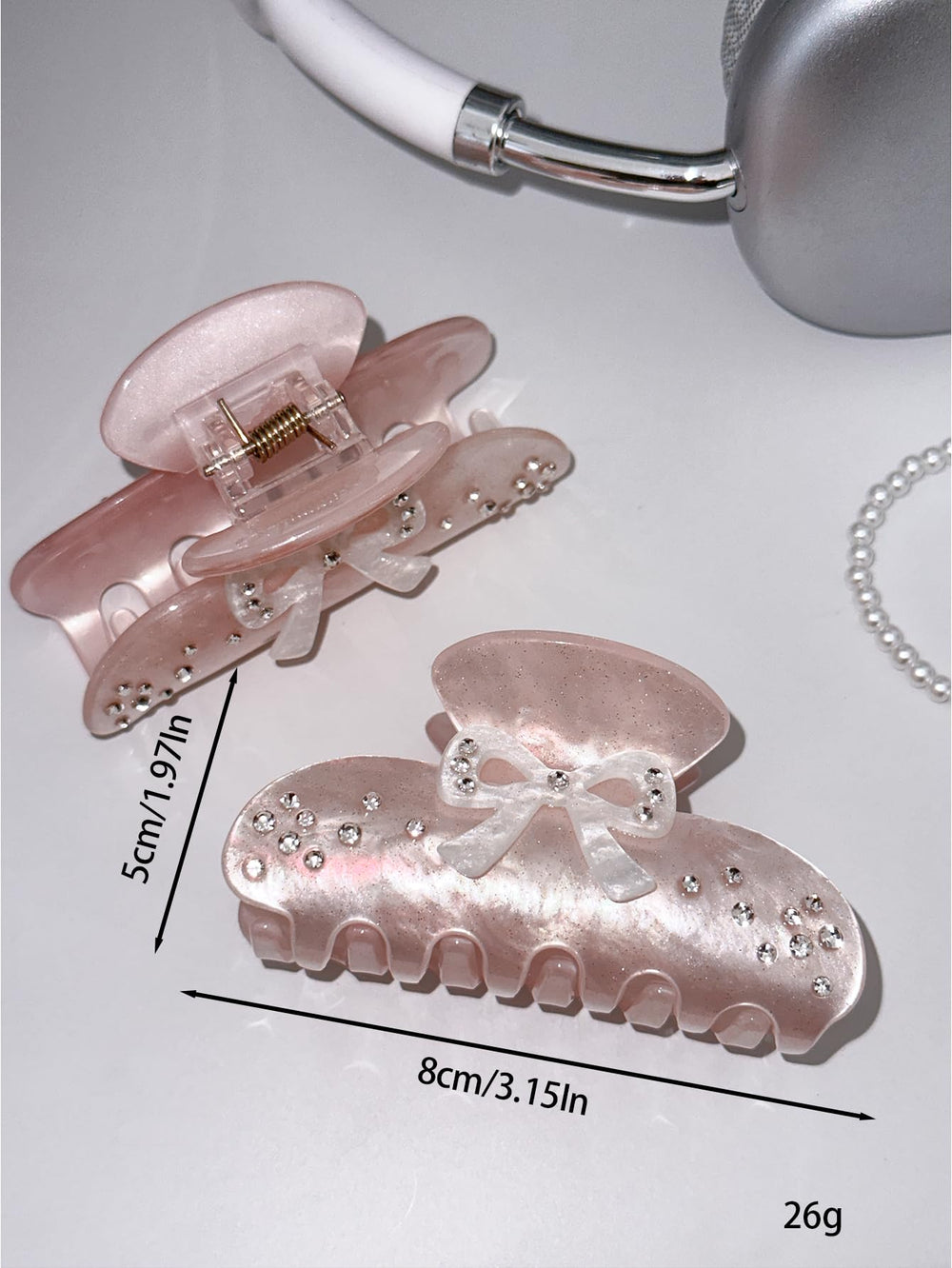 OUSEON evening lifestyle scene with bow clip adding subtle glam to outfit