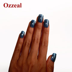 Ozzeal bottle cap and brush detail showing applicator precision for controlled polish benefit