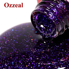 ozzeal hand holding bottle for scale showing true size and travel-friendly benefit